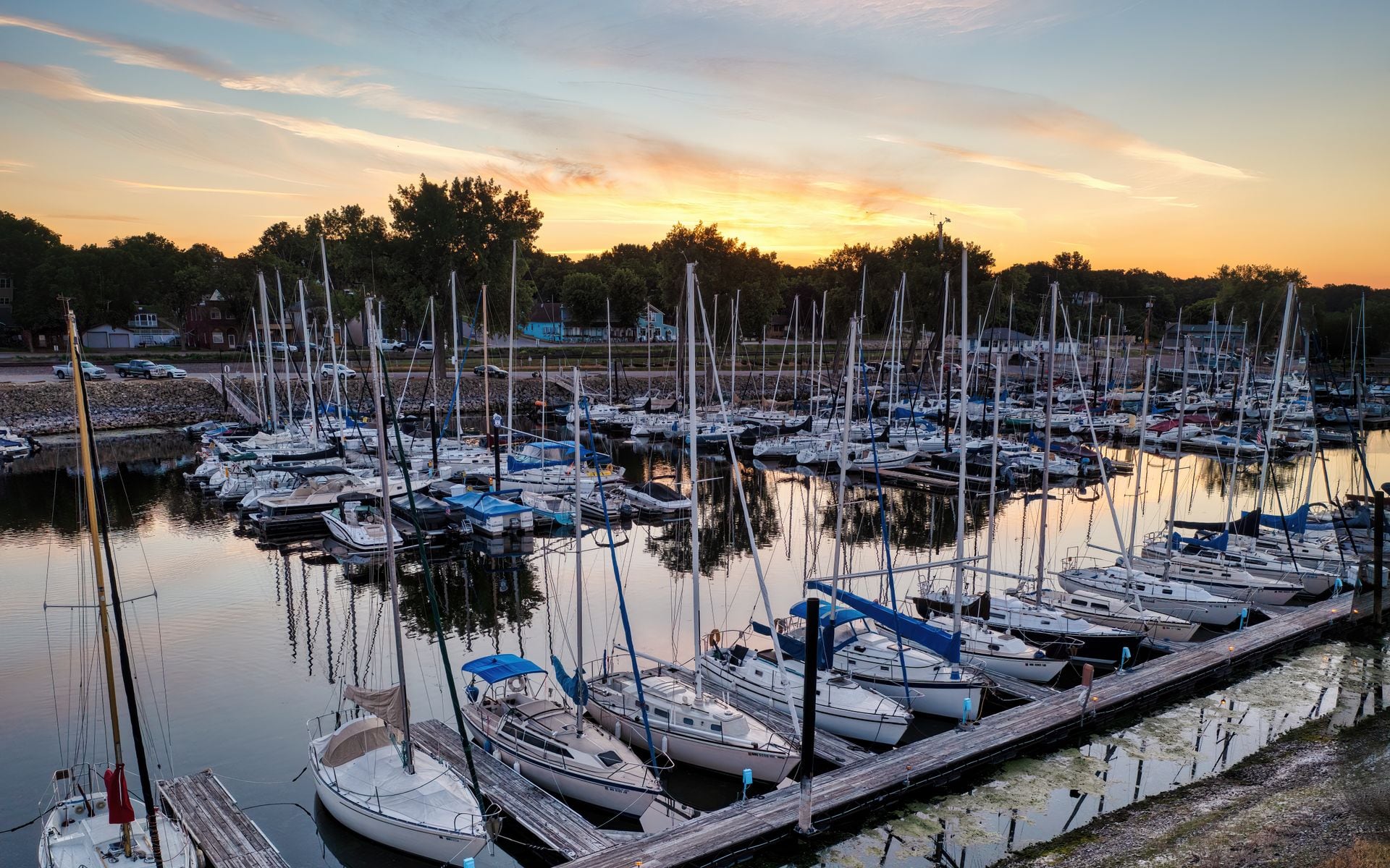 Bay-side village of Fish Creek with docked sailboats and bluff-lined shoreline on the Door Peninsula, Wisconsin
